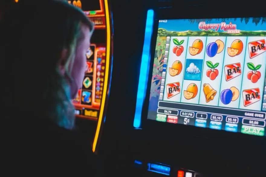 Player watching a Cherry Rain Deluxe slot machine screen