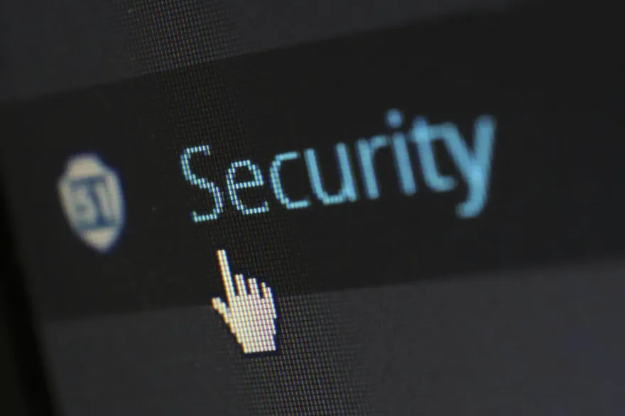 Close-up of the word Security on a screen with cursor