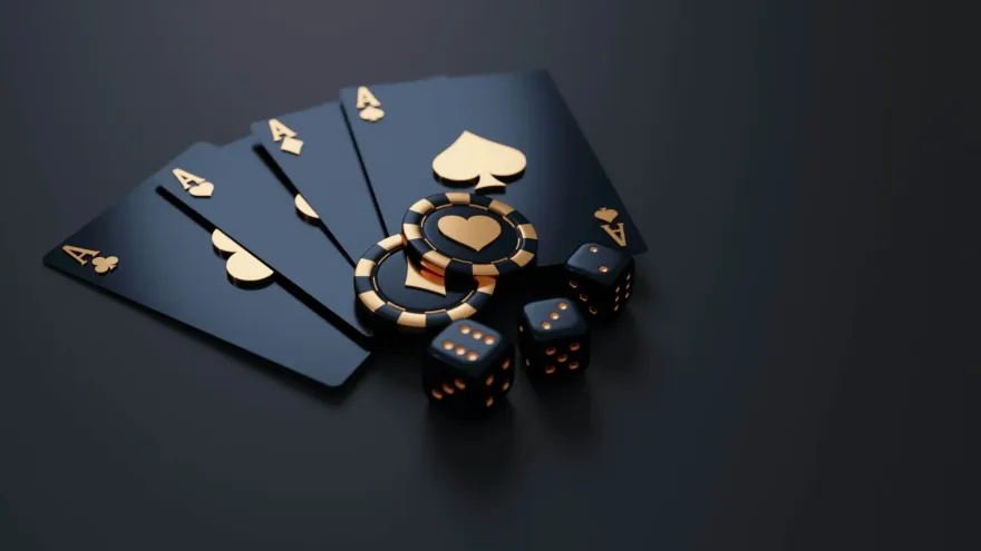 Four ace playing cards with poker chips and dice in gold and black