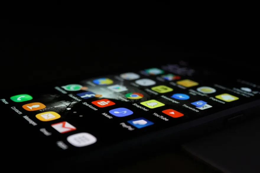 Smartphone home screen showing a grid of everyday app icons