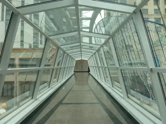An enclosed glass walkway connecting Casino Niagara to nearby hotel towers